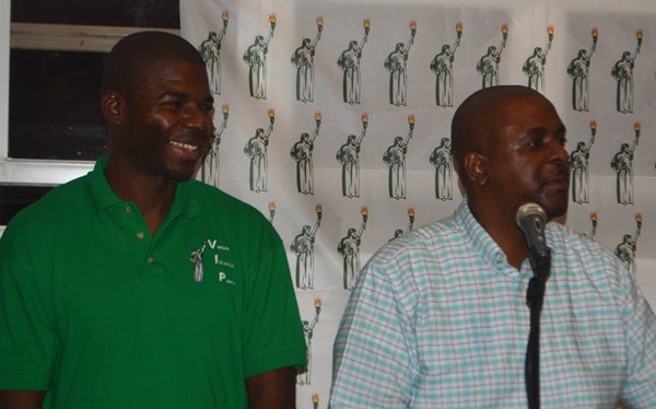 Fahie (right) along with his party's president Dr Natalio Wheatley during an event last evening