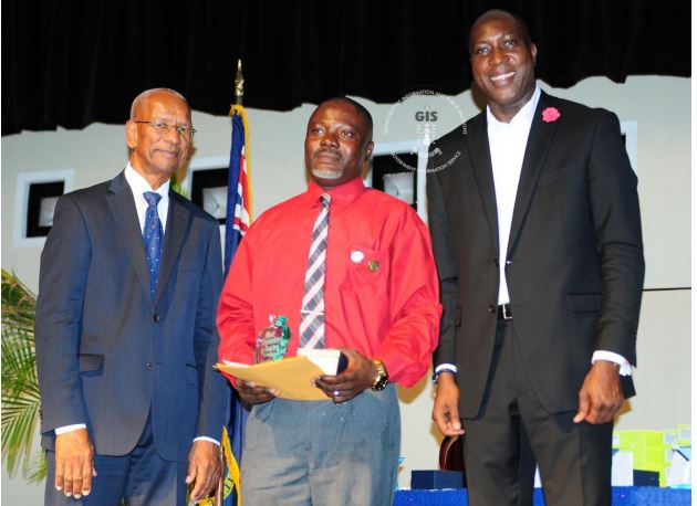 Honourable Dr. D. Orlando Smith, Premier and Minister of Finance, Teacher of the Year – Secondary, Zakaria Yunusah (Elmore Stoutt High School) and Honourable Myron Walwyn, Minister for Education and Culture.