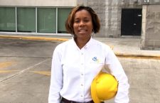 Shaina Smith in front Peebles Hospital on which she worked as project manager during the construction phase