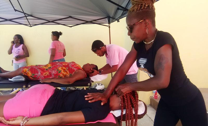 Hurricane Stress – Duo gives free massages in town