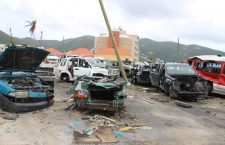 Derelict vehicles located inside the parking lot opposite Pussers in Road Town.