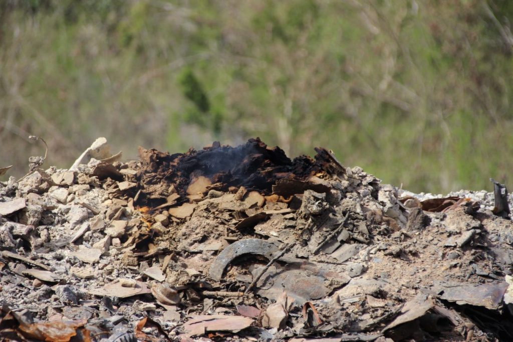 Setback: Fire flare-ups as workers clear Cox Heath dump