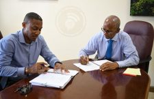 Directo of Projects (Dr Drexel Glascow, and Finance Minister Dr D Orlando Smith.