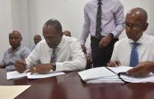 Government ministers sign $876,250 contract to design and develop permanent roads in BVI.