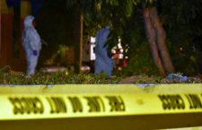 Crime scene investigators process the area of the shooting on February 3. (BVI News photo)