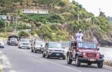 A motorcade of NDP supporters trail behind party leader Myron Walwyn on Saturday (Photo by Jessica Mikoleiczik)