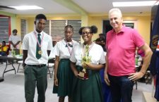 St George's Secondary School debate team with police commissioner Michael Matthews.