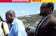 Premier Andrew Fahie (left) captured with one of his bodyguards recently.