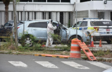This forensic officers processes this vehicle in custody at the Road Town Police Station. (BVI News photo)