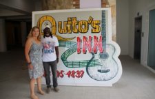 The Rymer's outside their newest business -- Quito's Inn in Cane Garden Bay.