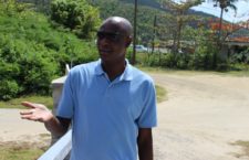 Chief Environmental Officer in the Ministry of Health, Lionel Michael warns against making contact with the pink, bacteria-riddled pond.