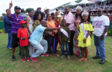 Premier Andrew Fahie presents the Premier Cup to owners and supporters of star USVI racehorse, THULEAN during the 2019 August Tuesday races on Tortola. (Photo by Andre 'Shadow' Dawson/BVI News).