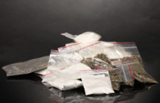 Cocaine and marihuana in packages on grey backgroundCocaine and drugs in packages on grey backgroundCocaine and marihuana in packages on grey backgroundCocaine and drugs in packages on grey background