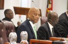 Labour Minister Vincent Wheatley (Forground)