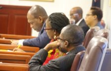 Legislators of Her Majesty's Loyal Opposition in the House of Assembly. (Julian Fraser in Foreground)