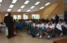 CXC Registrar Dr Wayne Wesley addressing parents, students and teachers at the St Georges Secondary School on Wednesday.