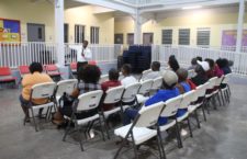 Second 'Mitch' Turnbull addressing residents of Spooners Estate during a community meeting on Tuesday.