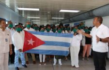Jamaica's Health Minister Dr Christopher Tufton (right) welcomes a team of Cuban health professionals to the country recently. (Contributed photo)