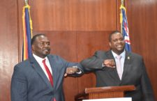 Bumping elbows have become one of the ways people around the world are using as an alternative to shaking hands to help stop the spread of the coronavirus. in this BVI News photo, Opposition Leader Marlon Penn (left) and Premier Andrew Fahie knock elbows at a joint press conference at the House of Assembly on Tuesday, March 24, 2020.