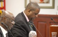 Attorney General Baba Aziz and Premier Andrew Fahie.