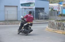 This fire services worker was captured riding his motor cycle in the Purcell Estate area of Tortola recently