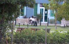A local man with no known place of abode is captured outdoors sitting by himself on a bench inside the Noel Lloyd Positive Action Movement Park in Road Town. He was photographed on the afternoon of Monday, April 7 in the midst of a territory-wide curfew. (Photo by Esther Durand/BVI News)