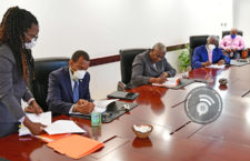 Contracts being signed by the Chairman of the SSB, Ian Smith; the Director of the SSB, Antoinette Skelton, and the Managing Director of James Todman Construction, James Todman.