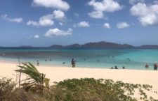 More than 100 beachgoers spotted at Smugglers Cove when beaches reopened for the first time in weeks on Sunday, May 10. (BVI News photo)