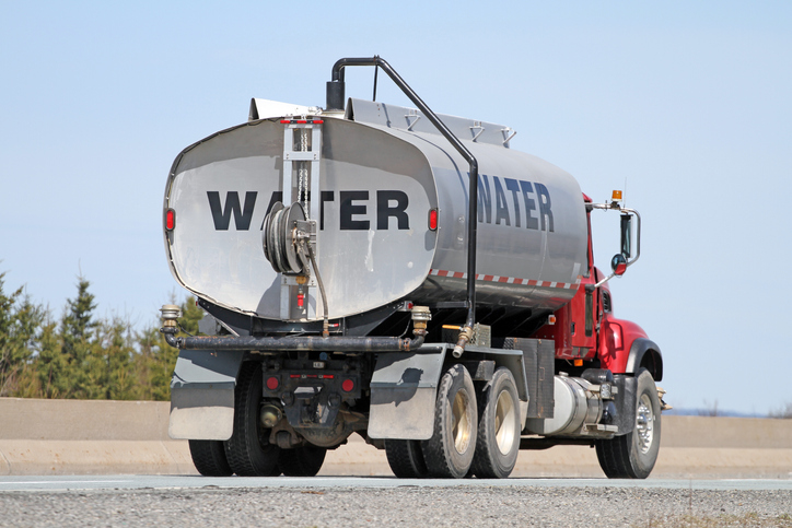 Questions raised over utility merger’s impact on water truckers