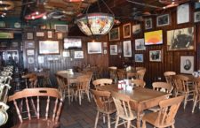 Empty dining tables at Pusser's Pub in Road Town.