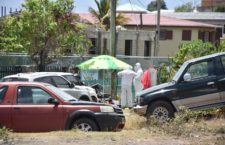 Health officials outside the home of Patient 12