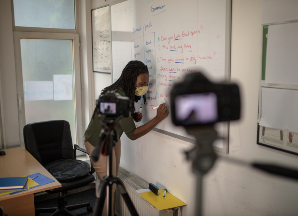 Blended learning. Teacher. Camera. Classroom.