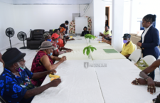 Territorial At-Large Representative Sharie de Castro with seniors at the East End/Long Look Community Centre. (Photo provided)