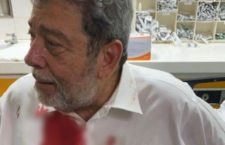 Prime Minister Dr Ralph Gonsalves after being hit on the head with a stone during a protest.
