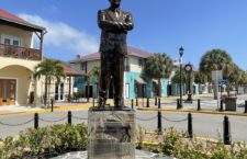 The statue of Cyril B Romney mounted at the pier park on Tortola.
