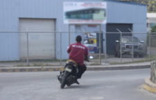 File photo of a fire services officer hiding a motor cycle.