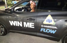 J'dya Sprauve is all smiles as she prepares to drive away in her new vehicle.