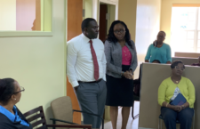 Health Minister Marlon Penn and Permanent Secretary Petrona Davies address members of staff at the Social Development Department. (Photo provided)