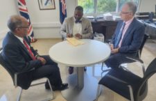 Deputy Governor David David Archer, Jr signs the Oath Allegiance and Oath for Due Execution of Office in the presence of Governor John Rankin and His Lordship, the Honourable Justice Paul Webster, Justice of Appeal of the Eastern Caribbean Supreme Court. (Photo provided)