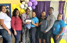 B2B Corporate Sales Manager, Bernice Magloire-Williams and members of the Cable & Wireless Business Team are pictured as they presented Principal of the Enis Adams Primary School, Mr. Todman, with back-to-school gift certificates for use by the students. Similar presentations were also made to the Principals of the St. George’s Secondary School, the Eselyn Henley Richiez Learning Center, the Seventh Day Adventist School, and the Elmore Stoutt High School. (Photo Credit: Flow)