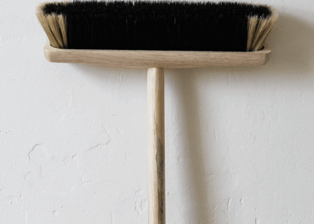 Bartender arrested after wounding man with broomstick