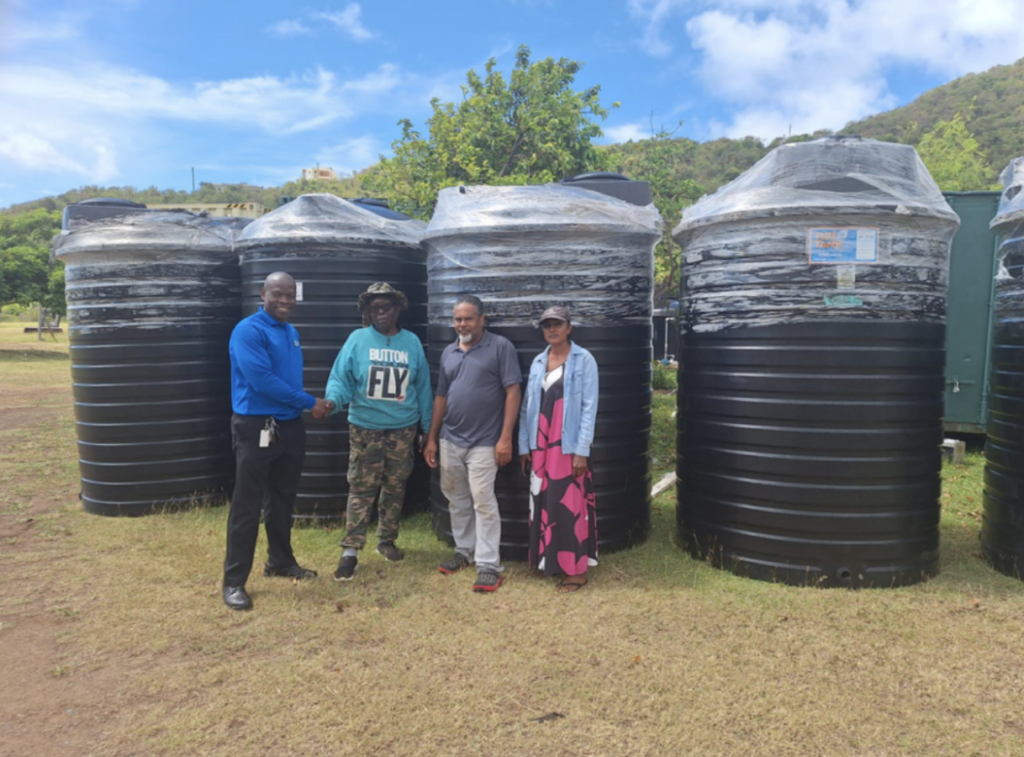 Paraquita Bay farmers receive water tank donations